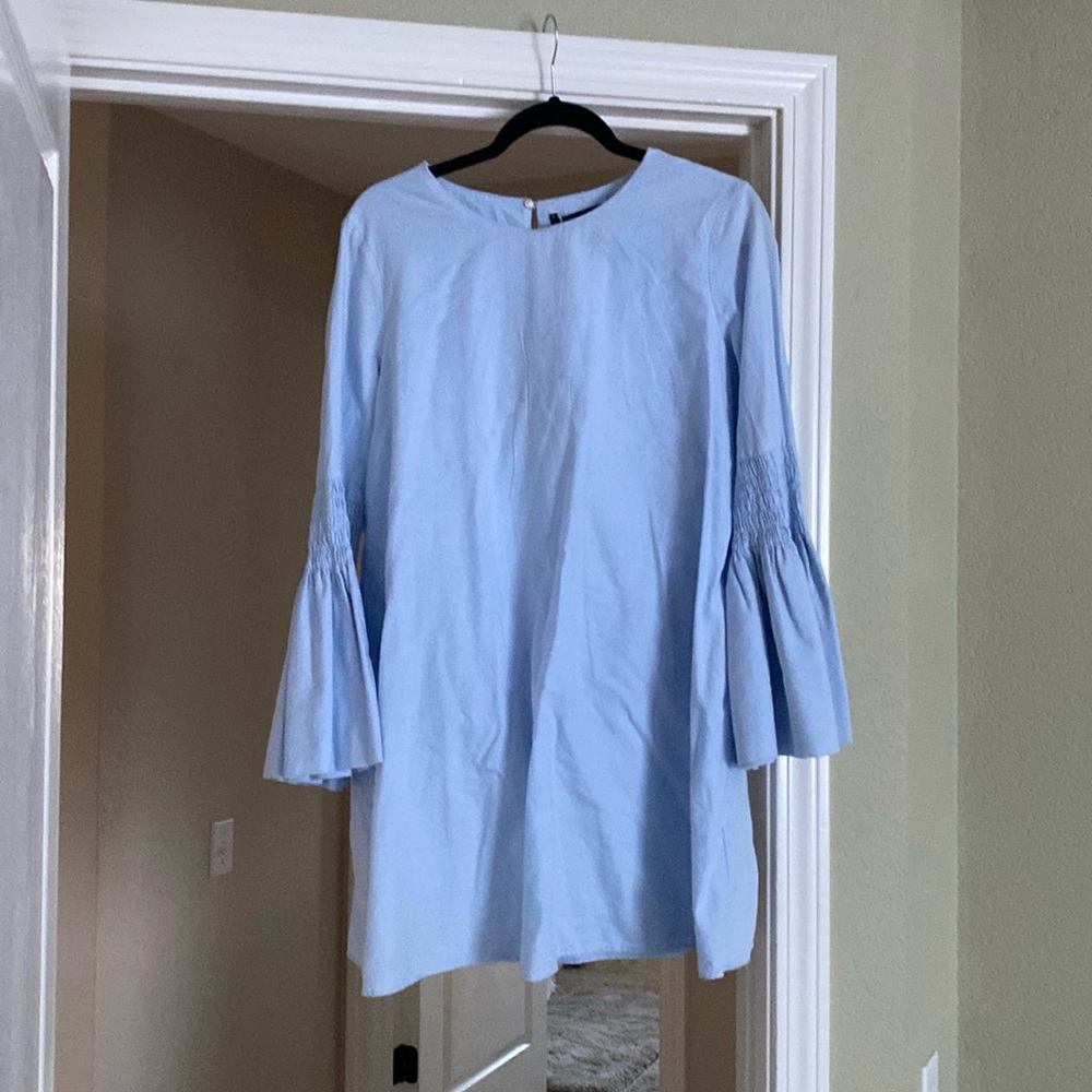 Light blue romper with full sleeves